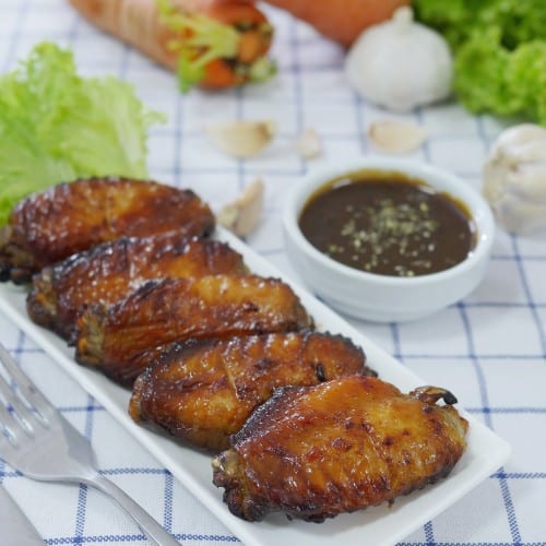 A8 (6) Chicken Wings W/ Fish Sauce Glaze.